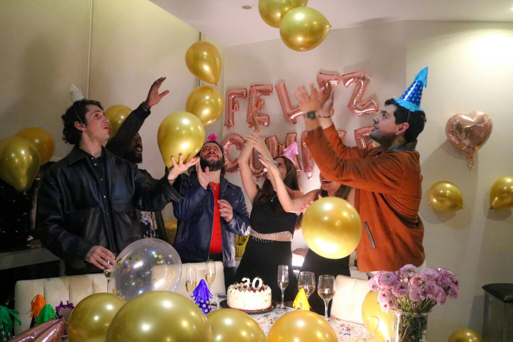 pexels-photo-30682919-30682919 Vibrant birthday party with friends celebrating amidst balloons and festive decorations.